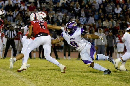 Lemoore's Trevor Gaffney wrapped up this runner for a loss.